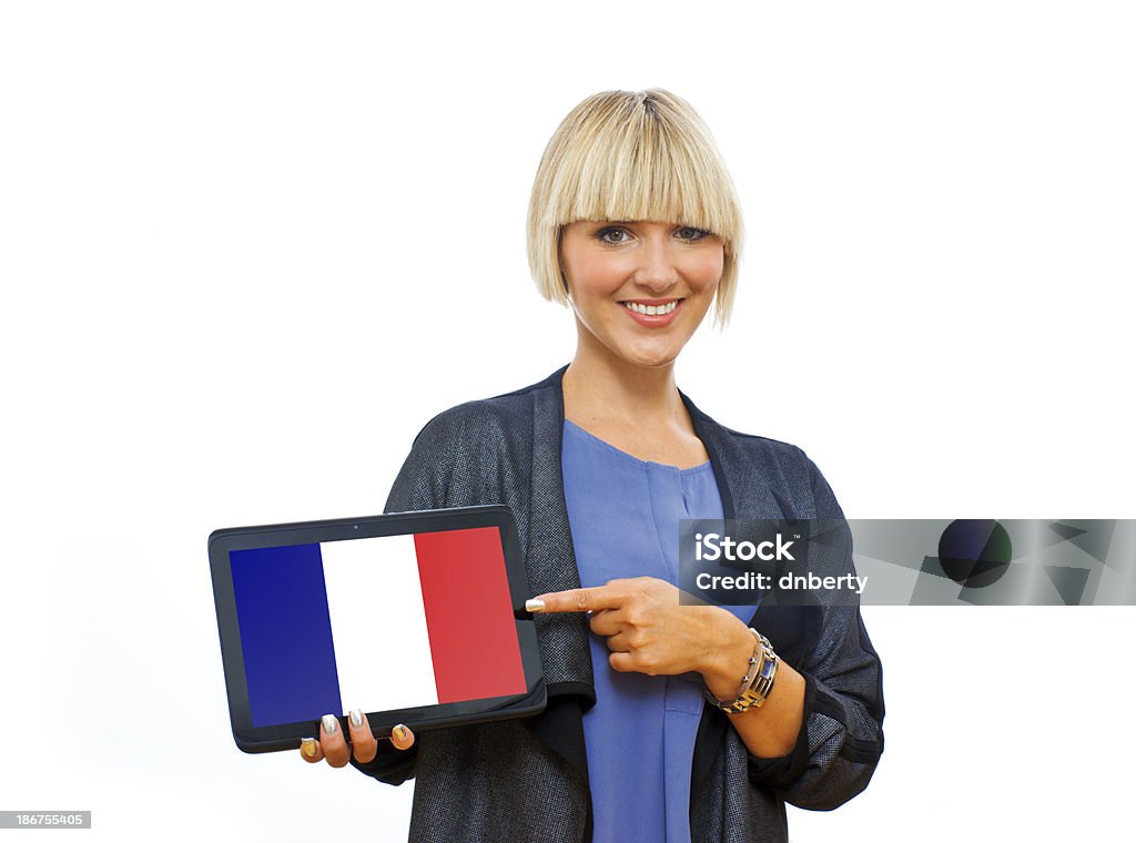 Loiro atraente mulher segurando a tablet com Bandeira da França - Royalty-free Adulto Foto de stock