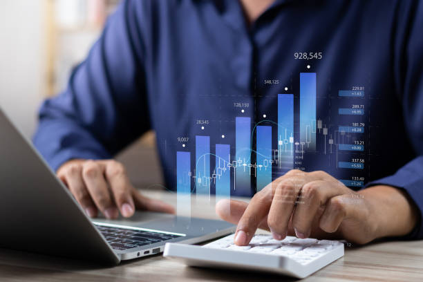 istock Finance and investment concepts. Businessman working with computer laptop analyzes profitability and growth of company, Account report and Economic growth graph chart, Data for long-term investments. 1867560436