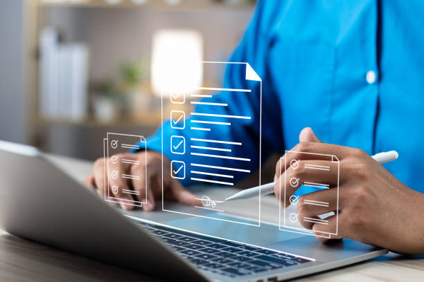 istock Electronic signature concept, E-signing, Business man using stylus pen signing contract electronic document on laptop, Document management, Sign agreement, E-documents for paperless transactions. 1867562551