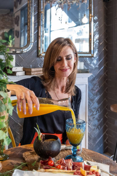 istock A sophisticated woman on a healthy lunch break. 1867565132