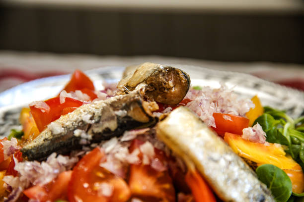 portuguese sardines in iron box on wooden table