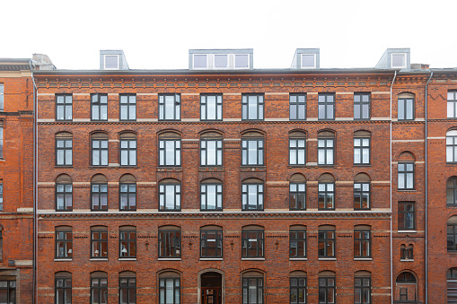 Red brick building facade background in Copenhagen