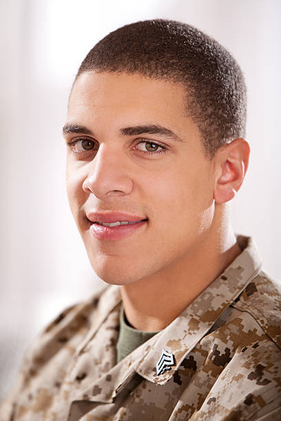 istock US Marine studyng at home on a laptop 186757610