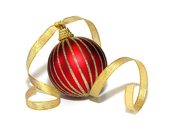 Red and gold christmas bauble isolated on white with golden ribbon.