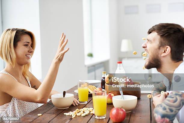 Breakfast Fun Stock Photo - Download Image Now - Catching, Food, Men