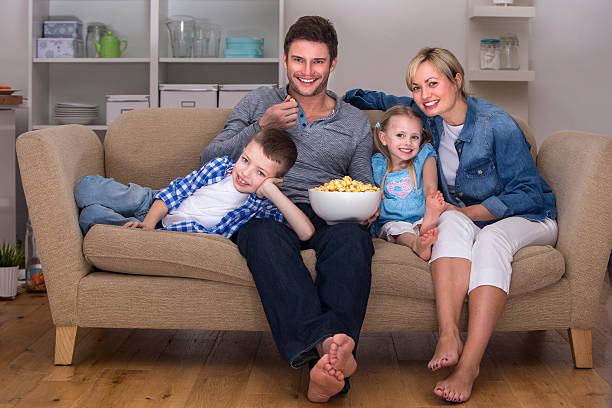 istock Family On The Sofa 186758888