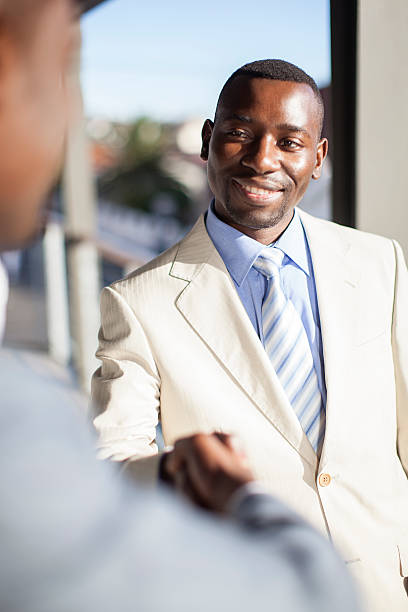 istock African Businessmen shaking hands. 186758899