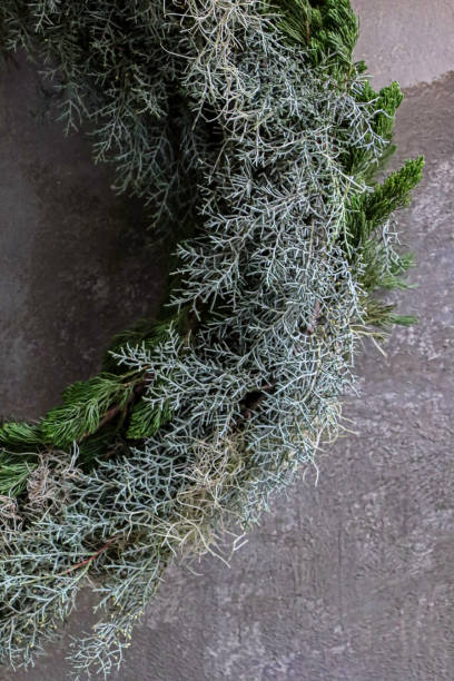 istock close up of pine branches on handmade Christmas wreath 1867592719