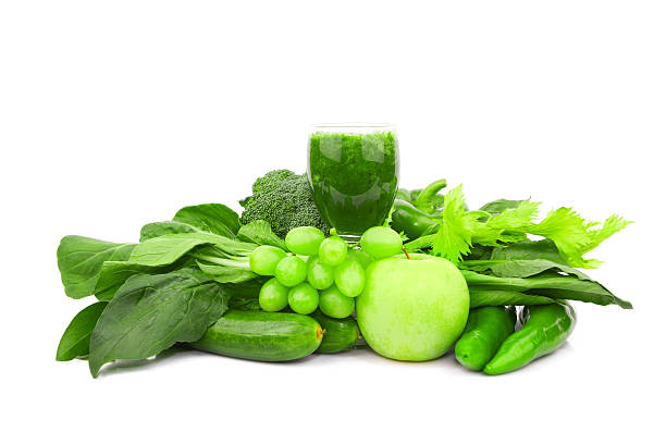 istock Green juice and Vegetable variety isolated on white background 186760000