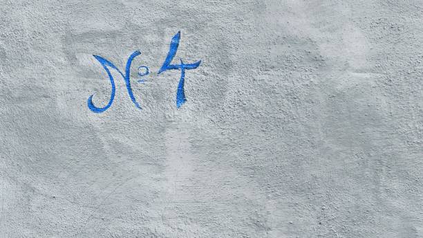 istock House number 4 written in blue color on gray background 1867606499