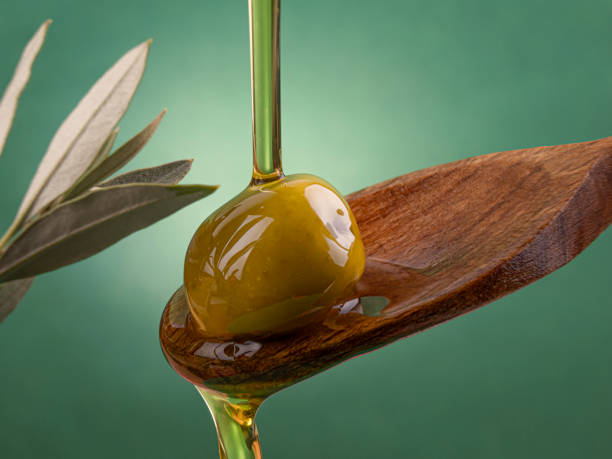 istock Olive oil poured into the spoon 1867618996