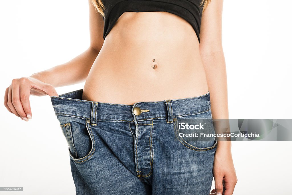Mujer de pérdida de peso - Foto de stock de Abdomen libre de derechos