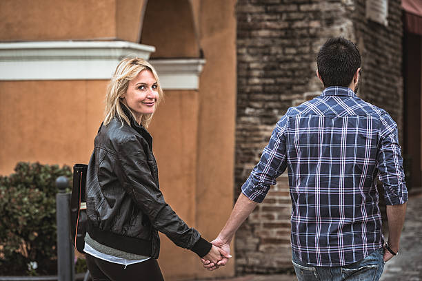 istock couple walking on the city 186762992