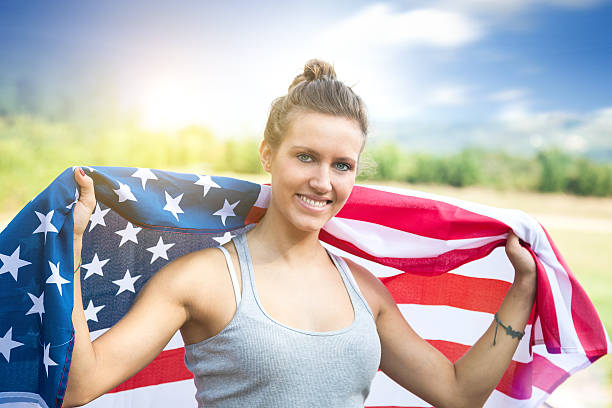 istock Beautiful US athlete with national flag 186763244