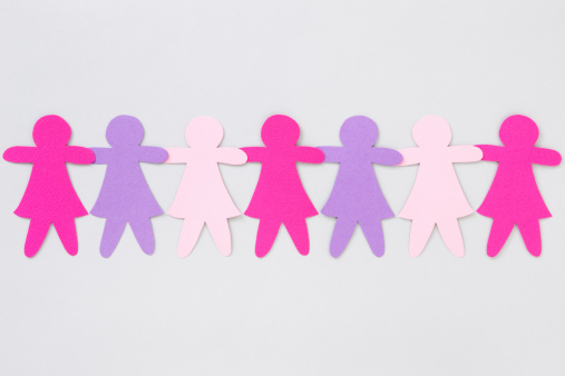 Chain of paper dolls in pink and purple colors