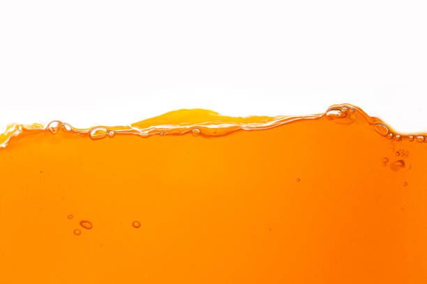 istock Orange juice isolated on white background,orange juice is isolated on white background. healthy fresh drink and natural waves. close up view. 1867653574
