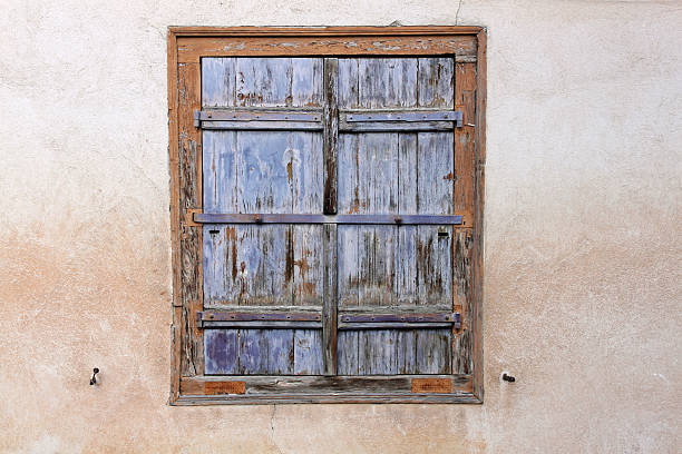 istock Old weathered shutter in Ribeauville, Alsace 186765563