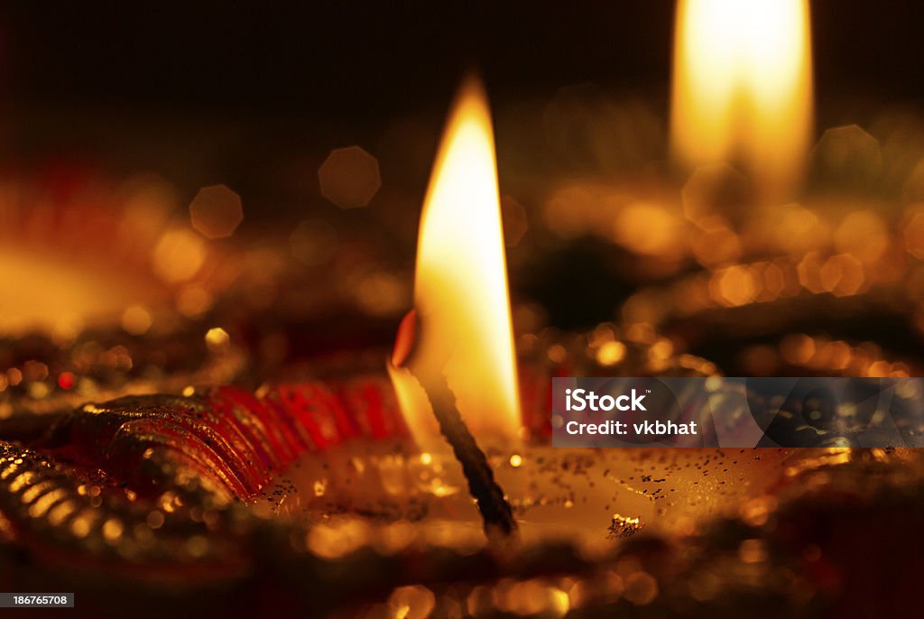 Indian traditional decorative earthen lamps Indian traditional decorative earthen lamps during Diwali festival with black background and copy space Black Background Stock Photo