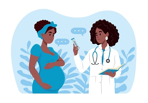 A pregnant woman is talking to an obstetrician gynecologist. Noninvasive prenatal testing (NIPT). A woman expecting a baby visits the doctors office, examination during pregnancy.