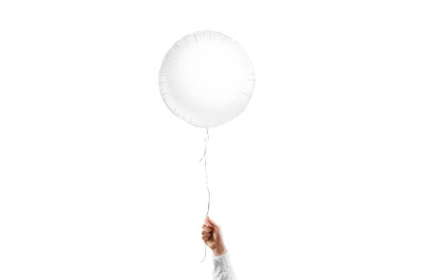 istock Hand holding blank white round balloon mockup, isolated 1867671880
