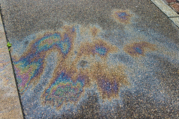 istock water pollution with oil on asphalt street 186768032