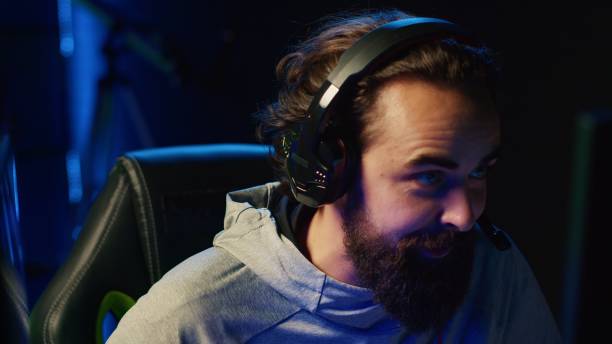 istock Player playing videogames in front of subscribers during livestream, providing commentary 1867692026
