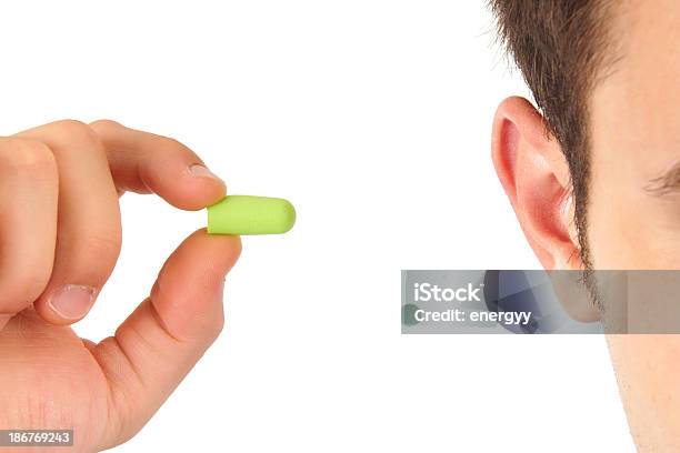 Green Earplug Stock Photo - Download Image Now - Front View, Ear, Ear Plug - Ear Protectors