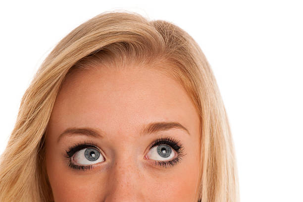 istock Blonde girl looking into copyspace 186769400