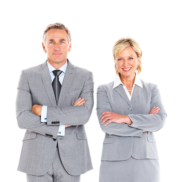 istock Experienced business executives standing on white 186769664