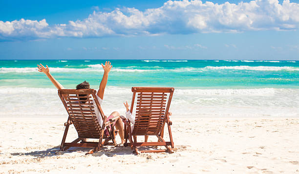 istock Father with little daughter in beach chairs on plage 186769749