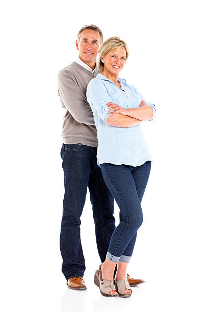 istock Confident mature couple together on white 186770078