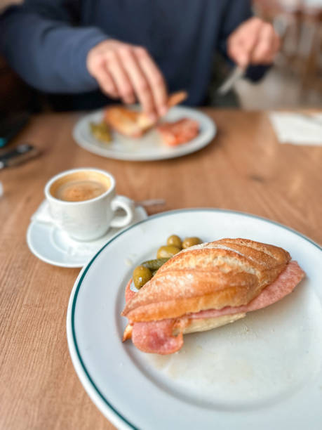 istock Bacon sandwich and coffee with milk in a bar 1867702676