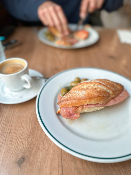 istock Bacon sandwich and coffee with milk in a bar 1867702688