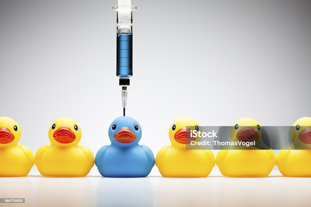 Stand out from the crowd - Rubber Duck Color Individuality http://thomasvogel.eu/istock/is_creative.jpg Healthcare And Medicine Stock Photo