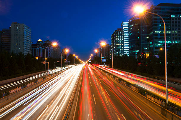 istock Rush hour traffic at night on multiple lane highway 186771671