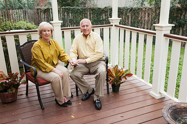 istock Senior couple sitting on porch 186771901