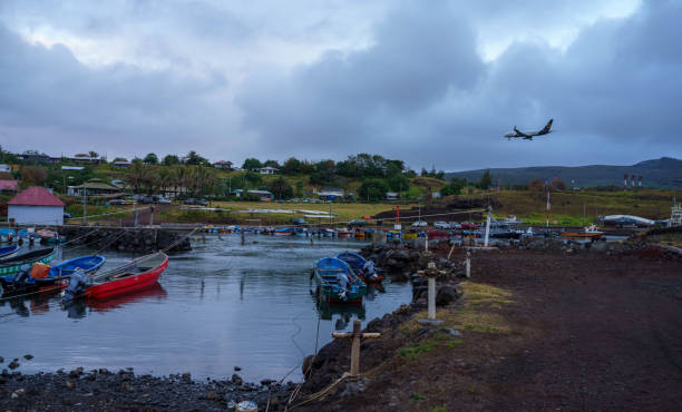 Hanga Roa, Easter Island, Chile - October 30, 2023: Latam airlines plane in the sky of Rapa Nui, Easter Island, Chile