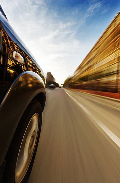 istock car on road with motion blur background. 186773249