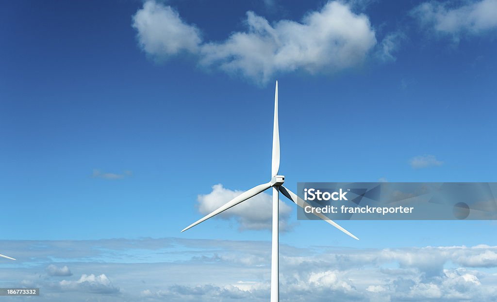 Wind turbine on blue sky http://blogtoscano.altervista.org/dy.jpg   Blue Stock Photo