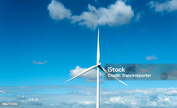 Wind Turbine On Blue Sky Stock Photo - Download Image Now - Blue, Cloudscape, Derbyshire