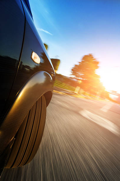 istock car on road with motion blur background. 186773374