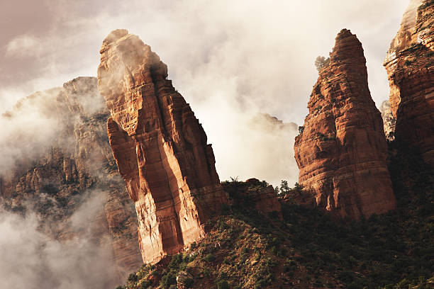 istock Rock Hoodoo Pinnacle Storm Mist Landscape 186773717