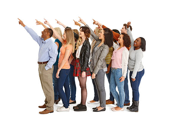 istock Group of multiracial people pointing towards something interesting 186773758