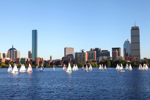 Sailboats on the Charles River with Boston's Back Bay skyline in the background. Boston is the largest city in New England, the capital of the state of Massachusetts. Boston is known for its central role in American history,world-class educational institutions, cultural facilities, and champion sports franchises.