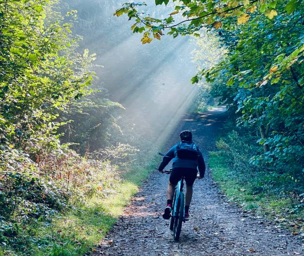 istock Cyclist in the morning sun 1867738205