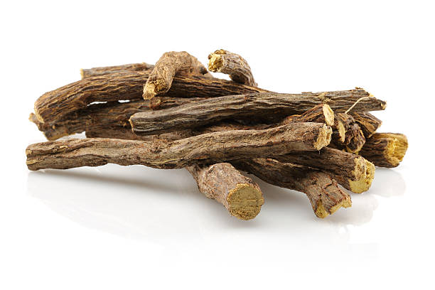 licorice root sticks stock photo