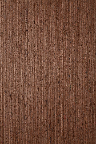 Wood texture - Wenge Wood - Wenge. High resolution natural woodgrain texture. Close-up. Photographed on Canon 5d mkIII + Canon EF 100mm f/2.8L Macro IS USM Lens. Developed from RAW, Adobe RGB color profile.The grain and texture added. faux wood stock pictures, royalty-free photos & images