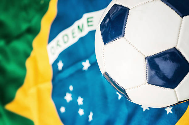 istock Soccer Ball and Brazilian Flag 186775388