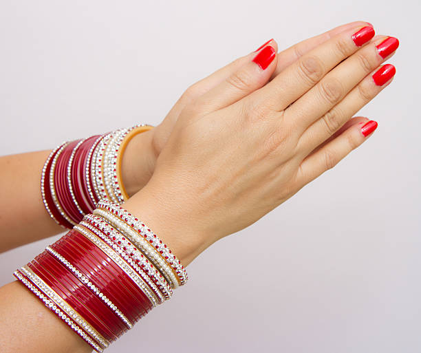 istock Indian married woman hands praying gesture 186776146