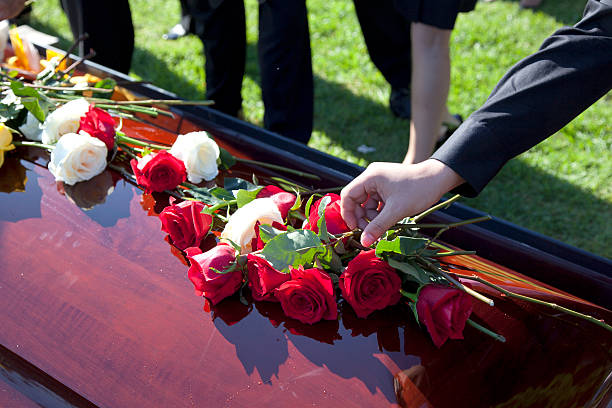 Funeral shot of roses and flowers on top of coffin coffin photos stock pictures, royalty-free photos & images
